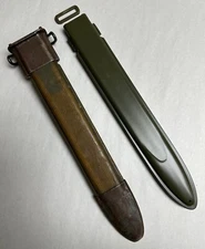 US M7 SCABBARD E-US DAMAGED/BROKEN WITH REPLACEMENT SPARE PLASTIC SHEAT.