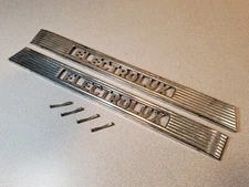 Electrolux Model XXX (30) Vacuum Cleaner Part: Pair of Chrome Logo Emblem Parts