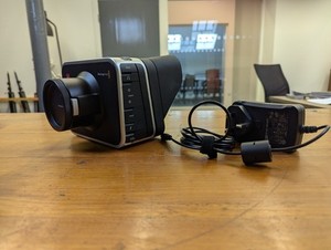 Blackmagic Cinema Camera 2.5K (EF Mount) – with Power Cable & Sun Visor Hood