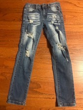 youth girls jeans size 10 with small stylish ripped holes.