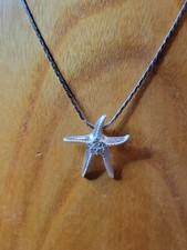 Silver Tone Starfish Pendant with Icy Rhinestone Accents with 18" Long Chain