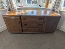 Ercol Windsor 455 Sideboard on Castors. Designed by Lucian Ercolani