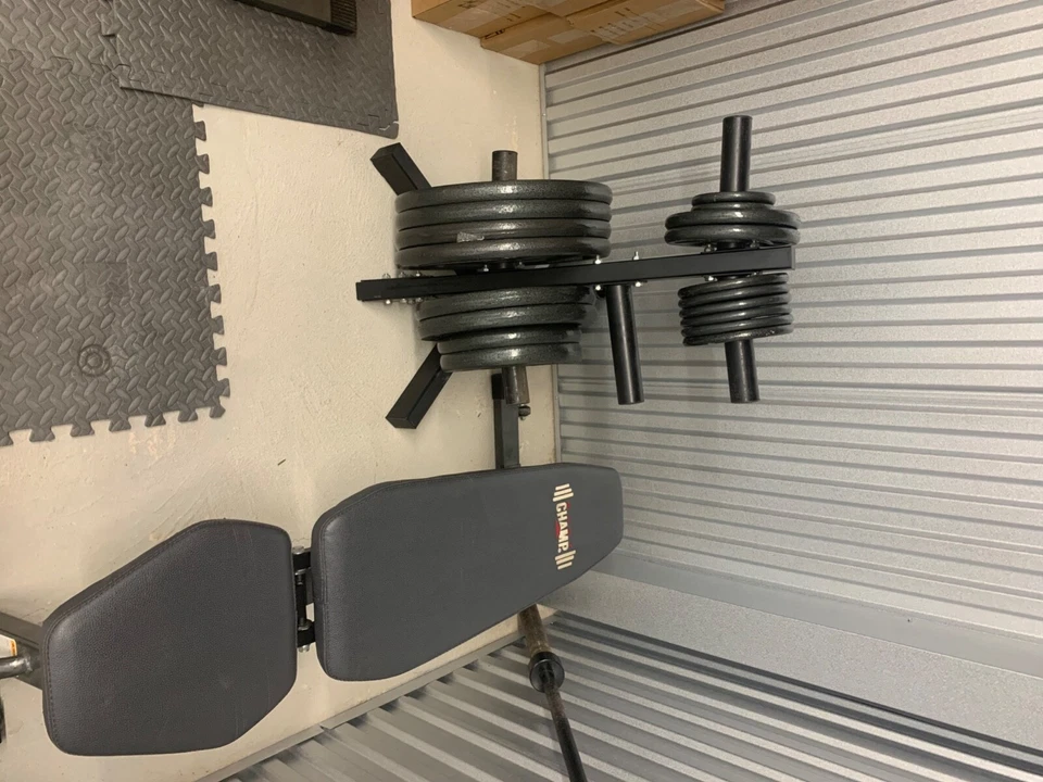 juego banco de pesas con pesas usado Foto 3 de 4