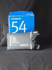 Polaroid 545 Pro back. Digital Timer. Excellent condition w/neoprene carry case.
