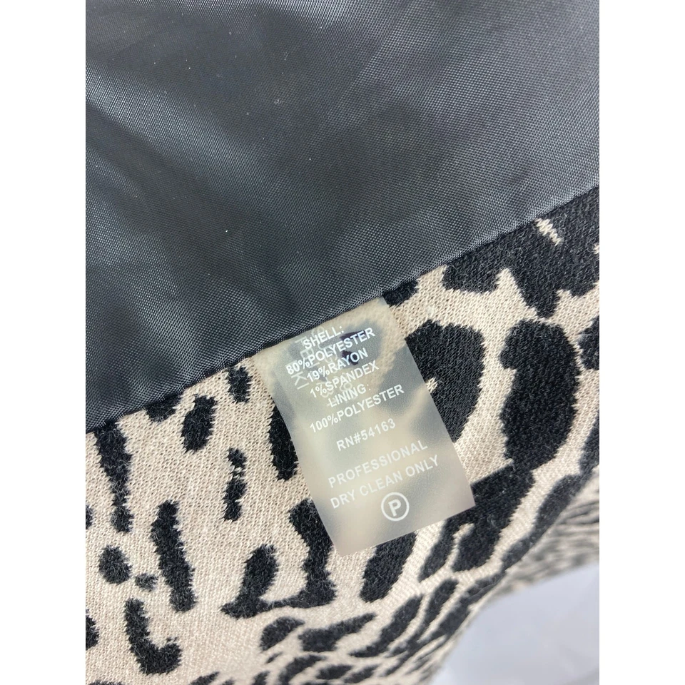 Suéter/Chaqueta Calvin Klein Estampado Animal con Volantes Frontales Talla 6 Foto 4 de 4