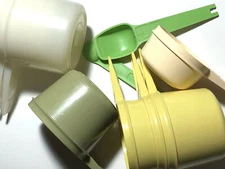 Genuine Tupperware measuring cups sold separately in various sizes and colors