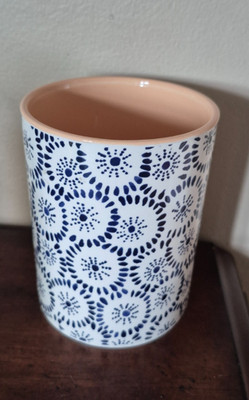 Geometric circles blue pattern ceramic container wirh peach color inside