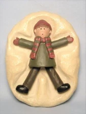Blossom Bucket SUZI Skoglund - A Boy Making a "Snow Angel" in the Snow - Retired