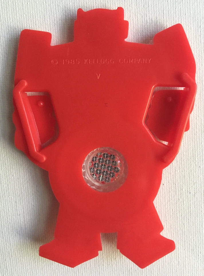 De colección 1985 Kellogg Cereal Premium Bicicleta Reflector Rojo y Blanco Robot Transformador Foto 2 de 2