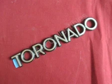 NOS OEM Oldsmobile "Toronado" Trunk Lid Nameplate Emblem 1986 - 89