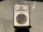 1883 O S$1 Ms 64 NCG Gem Reverse mount toner