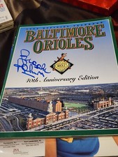 Brooks Robinson  Autographed 1994 40th Anniversary Yearbook. Coa