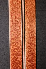 Pomelle sapele, flame maple, wenge and bloodwood, laminated guitar neck blank.