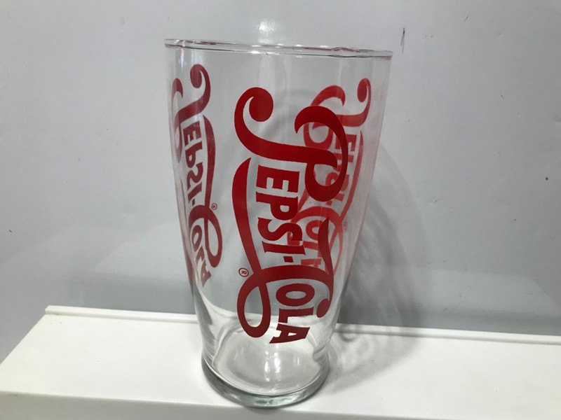 Pepsi  seventies 28 oz. clear glass red writing no chips cracks or missing paint
