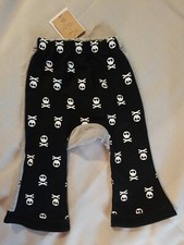 MONKEY PANTS WITH SKULLS ON THEM BY NADI" A BIFFI SIZE 6 TO 12 MONTHS