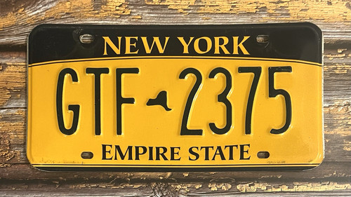 Expired 2010 New York Automobile License Plate GTF 2375 Empire State NY