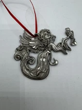 1996 Rawcliffe Pewter Angel And Dove Ornament. Diamond Cut.