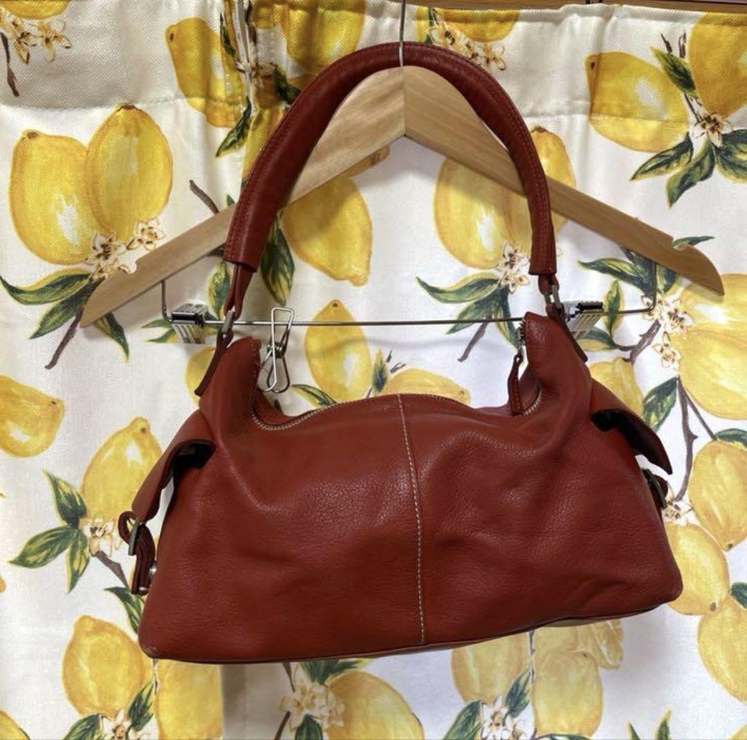 SAINT LAURENT Borsa a tracolla Yves Valente in pelle di vacchetta arancio scuro usata