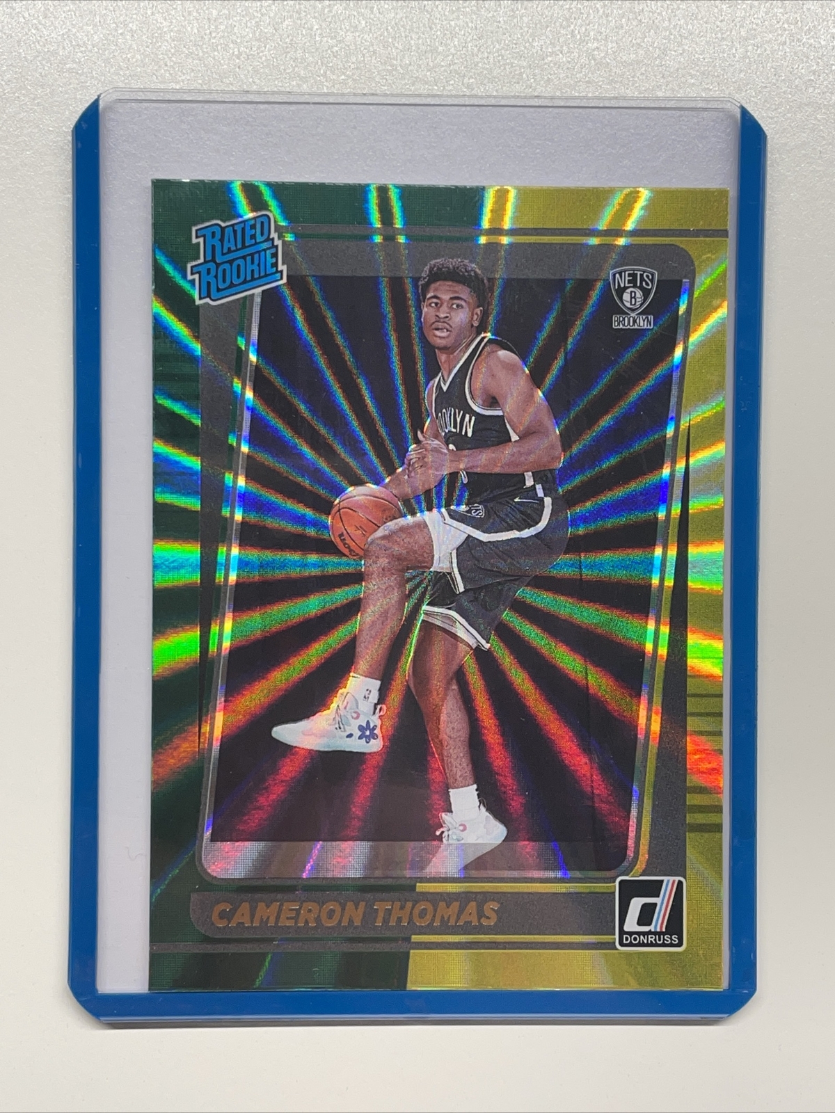 2021-22 Panini Donruss Cameron Thomas Green and Yellow Laser Rated Rookie RC 203