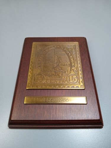 Estampilla de latón de madera Liberty 1886-1986 placa Avon  - Imagen 1 de 8