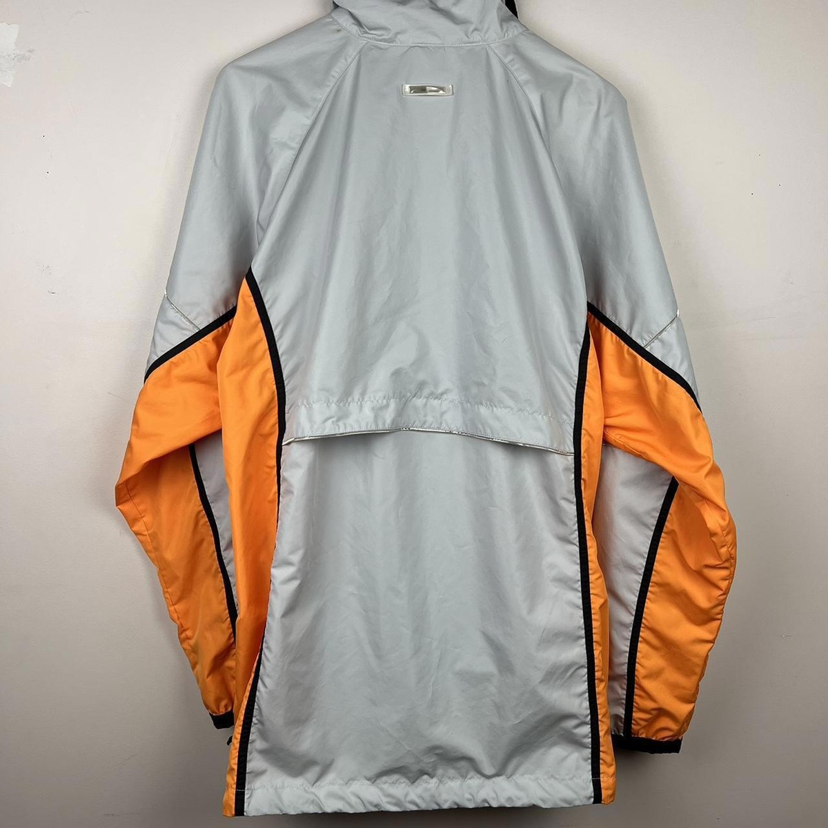 grey and orange nike windbreaker