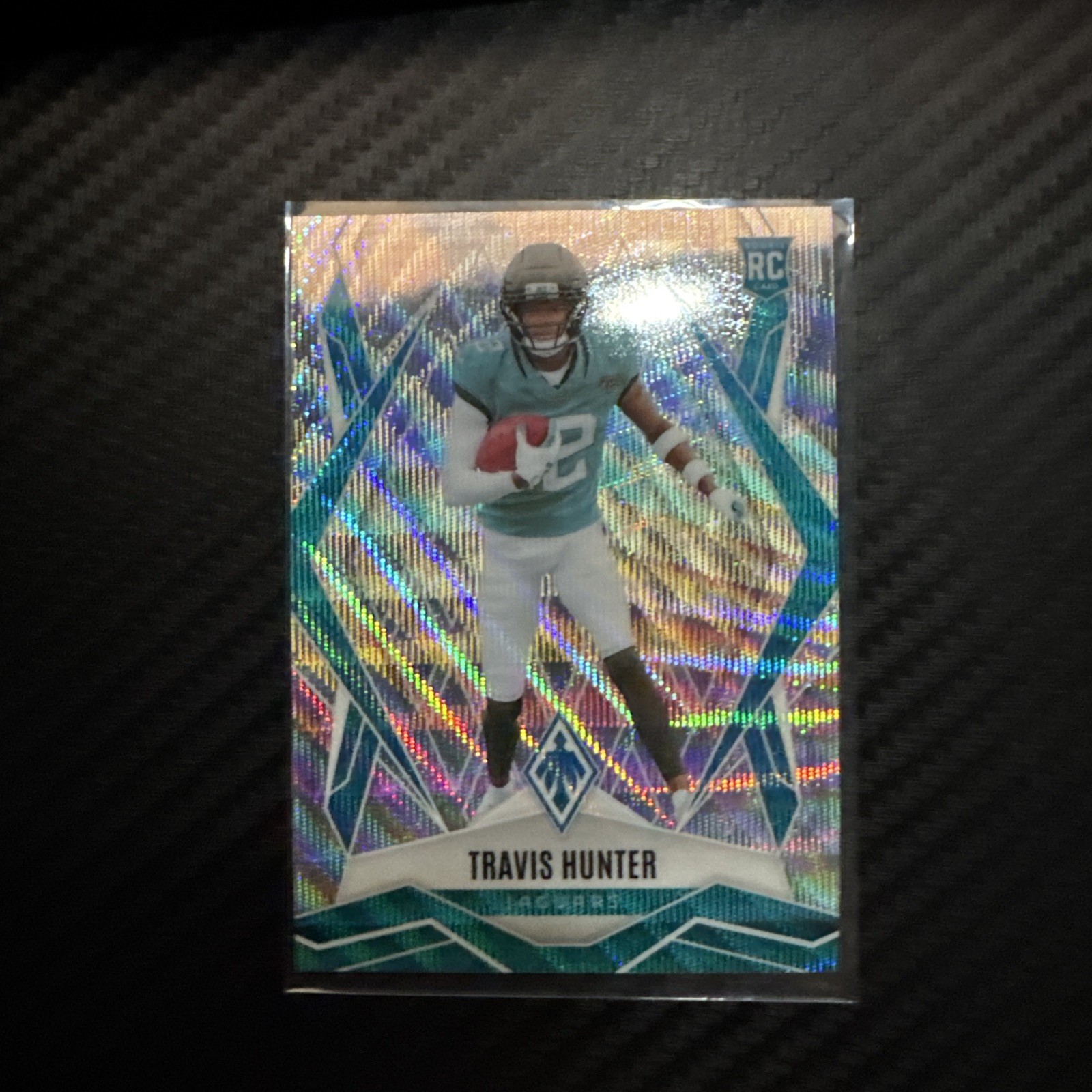 2025 Panini Phoenix - Rookies Travis Hunter #157 Wave /199 (RC)