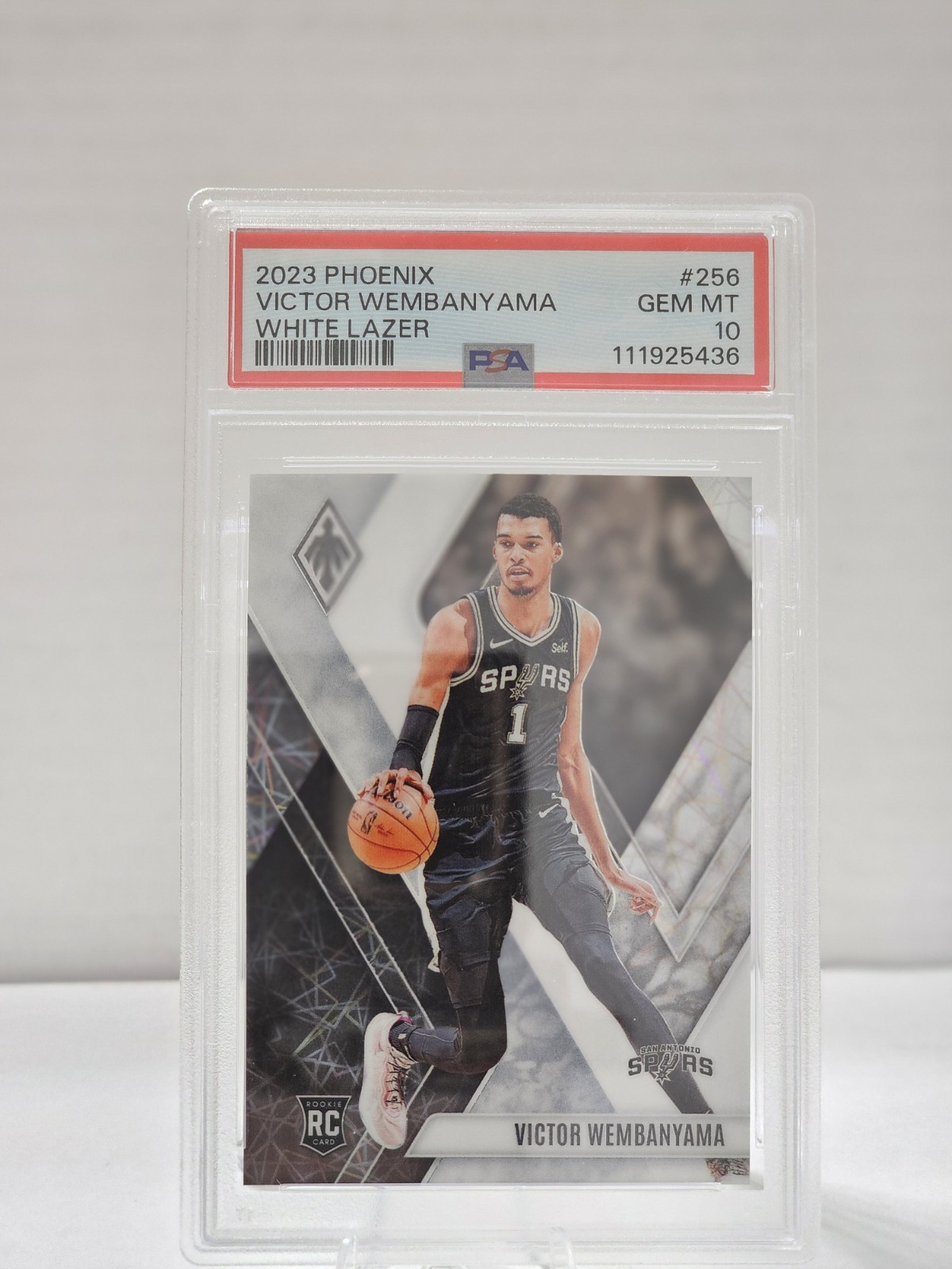 2023 PANINI PHOENIX #256 VICTOR WEMBANYAMA WHITE LAZER /150 - PSA 10