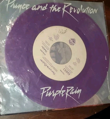Purple Rain, Prince 45 Rpm 1984 Warner Bros Purple Vinyl B/W God Plastic Sleeve