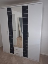 White Freestanding 3 Door Wardrobe Mirrored Centre, 2 Drawers, Rail & Shelf