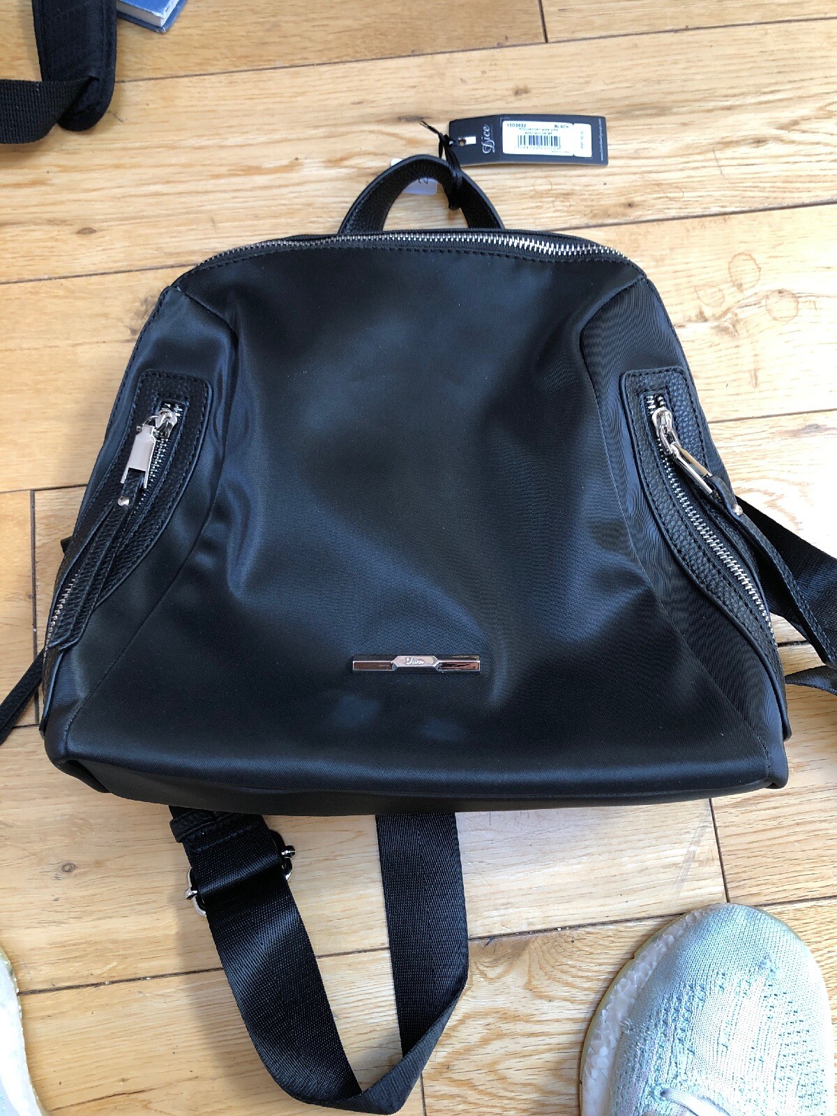 backpack that zips in the back