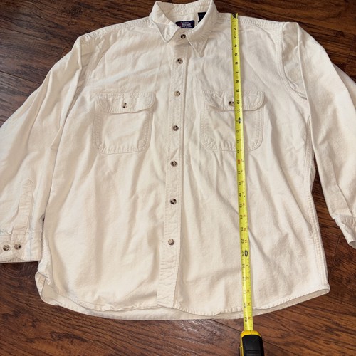 Ivory vintage five-brother flannel button-down shirt with long sleeves, two chest pockets, and yellow measuring tape.
