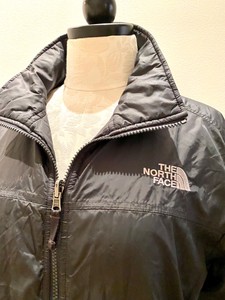 black puffy north face jacket