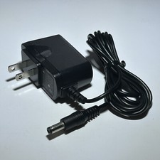 Logitech Switching Adapter P/N: 534-000299 Model ASUC12A-100070 10V 0.7A