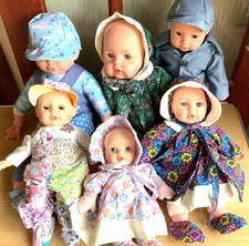 my set of 6 dolls dressed in handmade outfits ranging from 12" to 20" sizes