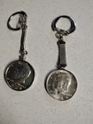 1) 1964 Kennedy Half Dollar Key Chain 1) 1968 Kennedy Half Dollar Key Chain.