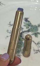 VINTAGE HARRIET HUBBARD AYER  EYE SHADOW GOLD METAL TUBE NEW PURPLE  COLLECTIBLE