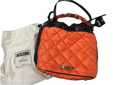 Borsa donna Moschino usata in ottime condizioni arancione imbottita con tracolla e catena