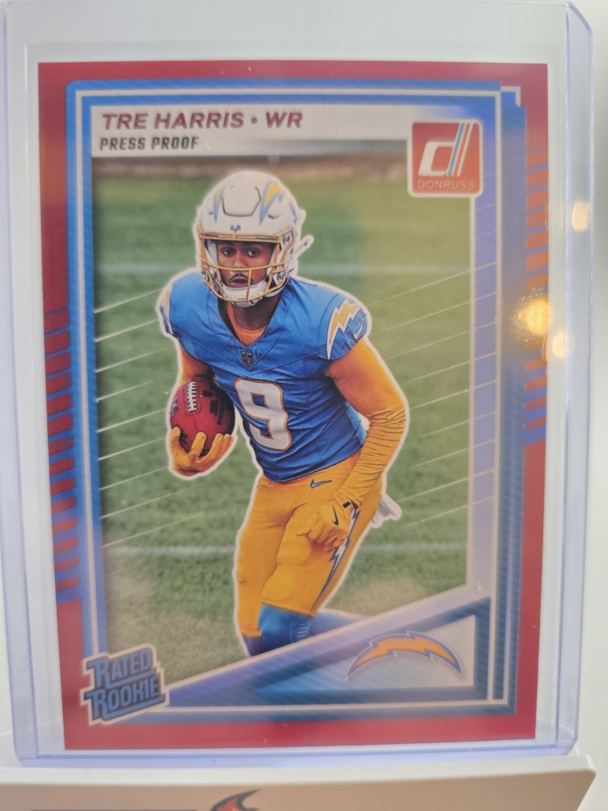 2025 Panini Donruss - Rated Rookie Tre Harris #329 Press Proof Red (RC) Chargers