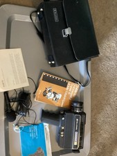 Bell  Howell Filmsonic XL Power Zoom 1235 Movie Camera w/Case and Accessories