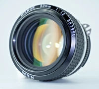Listing[A. UNUSED] Nikon Ai-S NIKKOR 50mm f/1.2 MF Prime Lens SIC #387950 From JAPAN