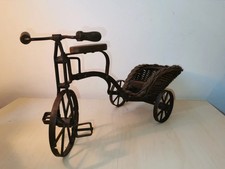 Antique vintage metal tricycle with a wicker basket home decor collectable