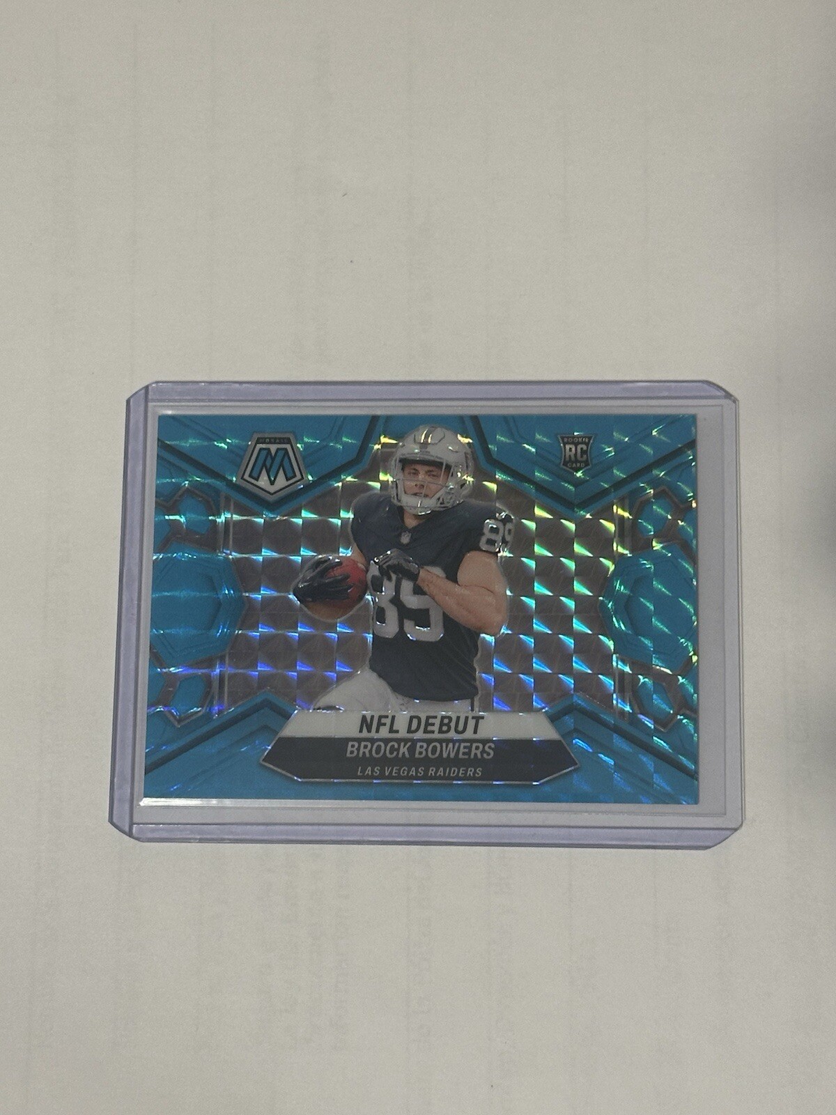 2024 Panini Mosaic NFL Debut Brock Bowers RC Blue Fluorescent /15 #286