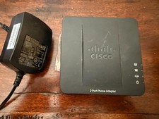 Cisco SPA 122 ATA 2 Port Phone Adapter and Router with AC Adapter