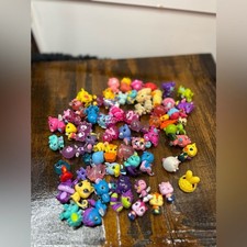 Lote de docenas de animales brillantes coloridos LPS Minis Shopkins Num Noms