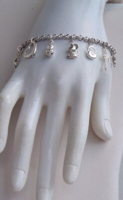  VINTAGE ARMBAND ARG.925 RHODINIERT UND EINE KASKADE VON ANHÄNGERN ALLE GEMARKT 925