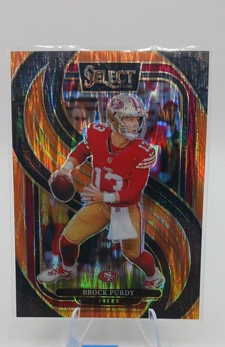 2024 Panini Select - Premier Level Brock Purdy #124 Orange Shock Prizm /399