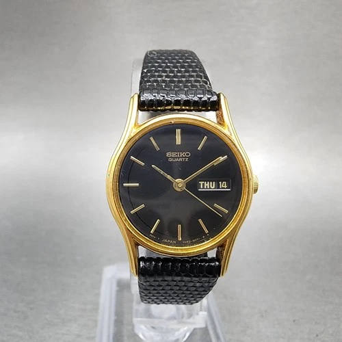 Seiko Watch Women 22mm Black Dial Gold Tone Daydate 7n83-6021 New Battery
