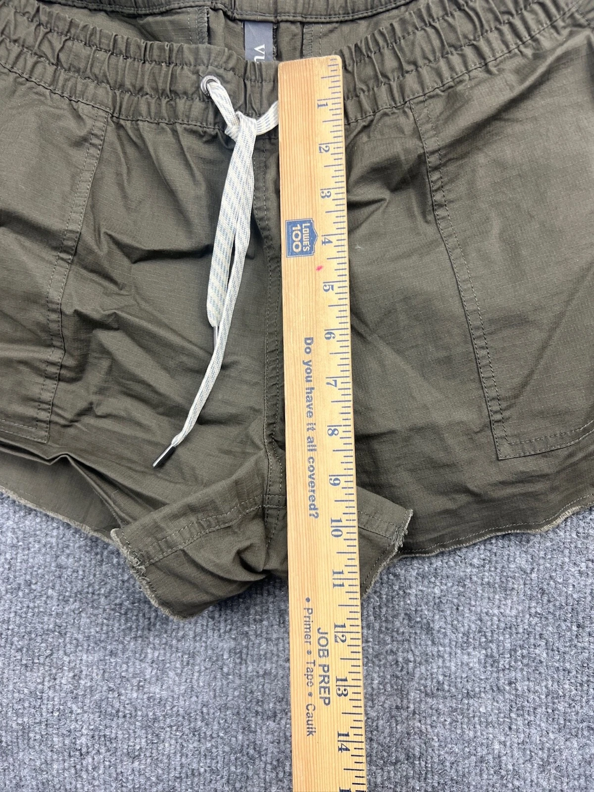 vuori drawstring elastic waist pockets raw hem zip pocket shorts