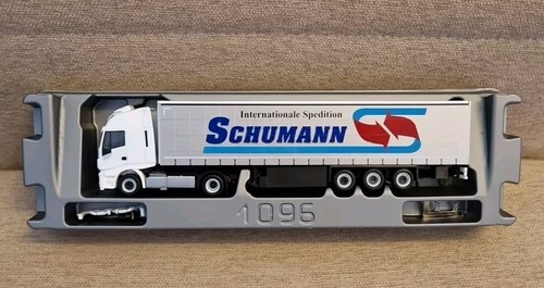 Herpa 310048 Schumann Iveco Stralis Gardinenplanen-Sattelzug OVP - Bild 2 von 2