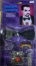 NOS Instant Vampire kit. With Fangs Bow Tie Medallion Halloween Scary Costume